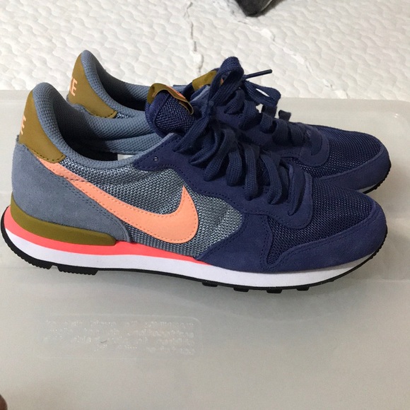 multi colored nike running shoes
